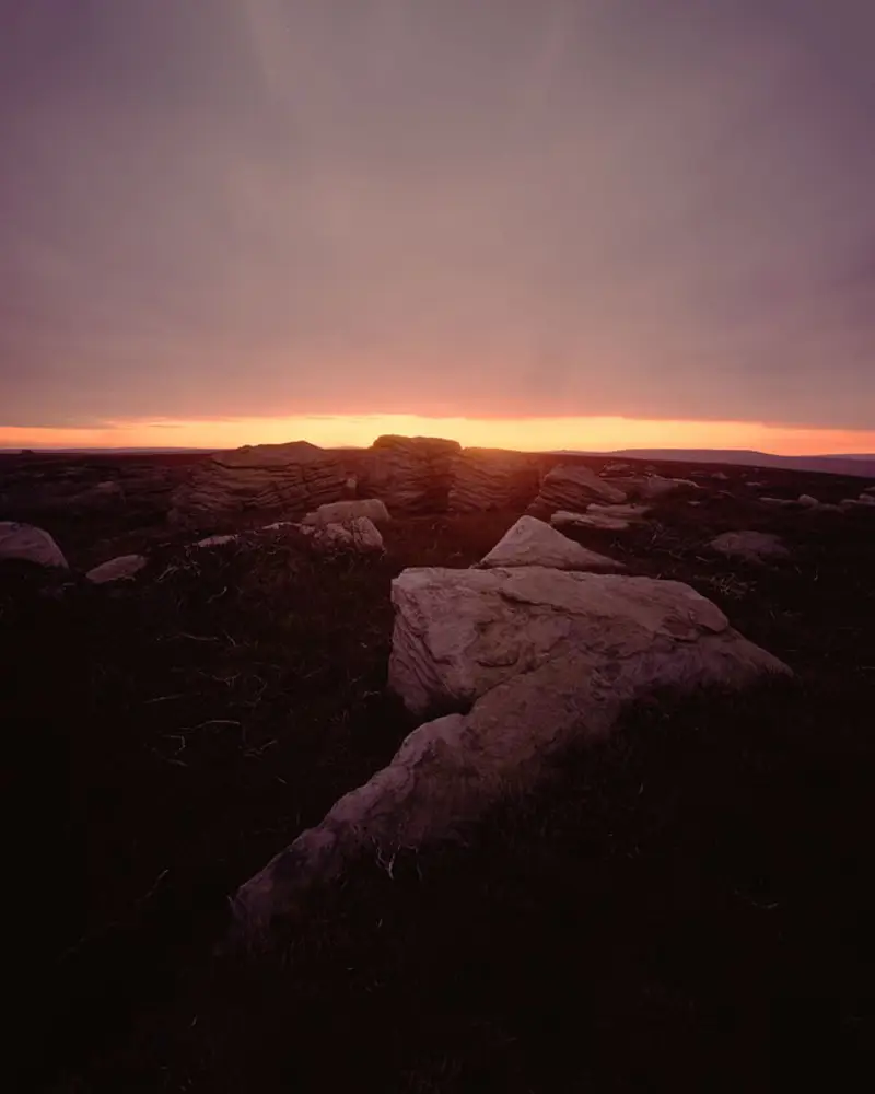 a sunset over a snow covered mountain. sky outdoor cloud landscape nature sunrise hill mountain sunset