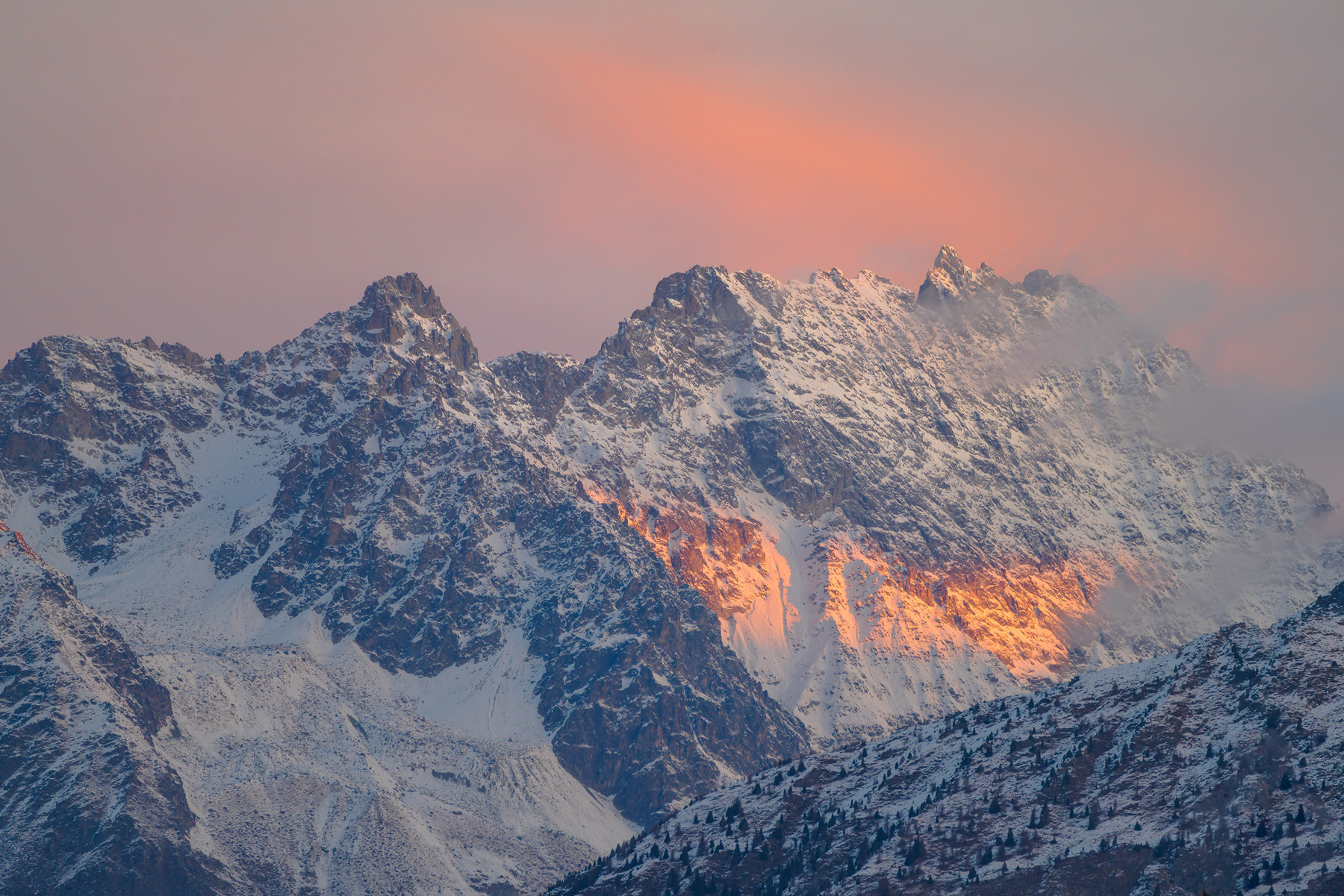 a snowy mountain with a sunset. mountain nature outdoor sky summit landscape mountain range sunset ridge winter cloud massif glacial landform sunrise araate alps snow