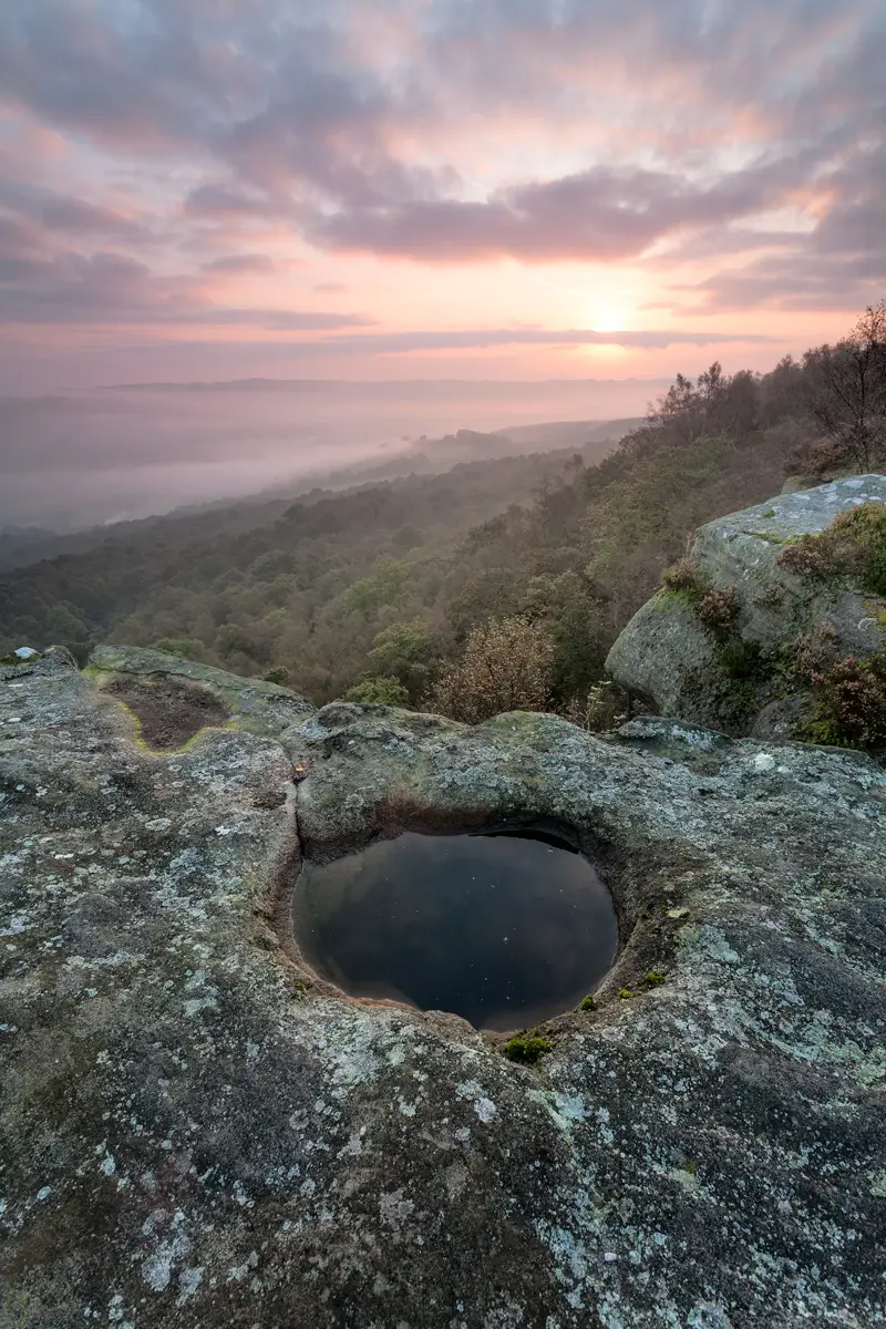 a rocky hill. outdoor sky mountain nature landscape cave