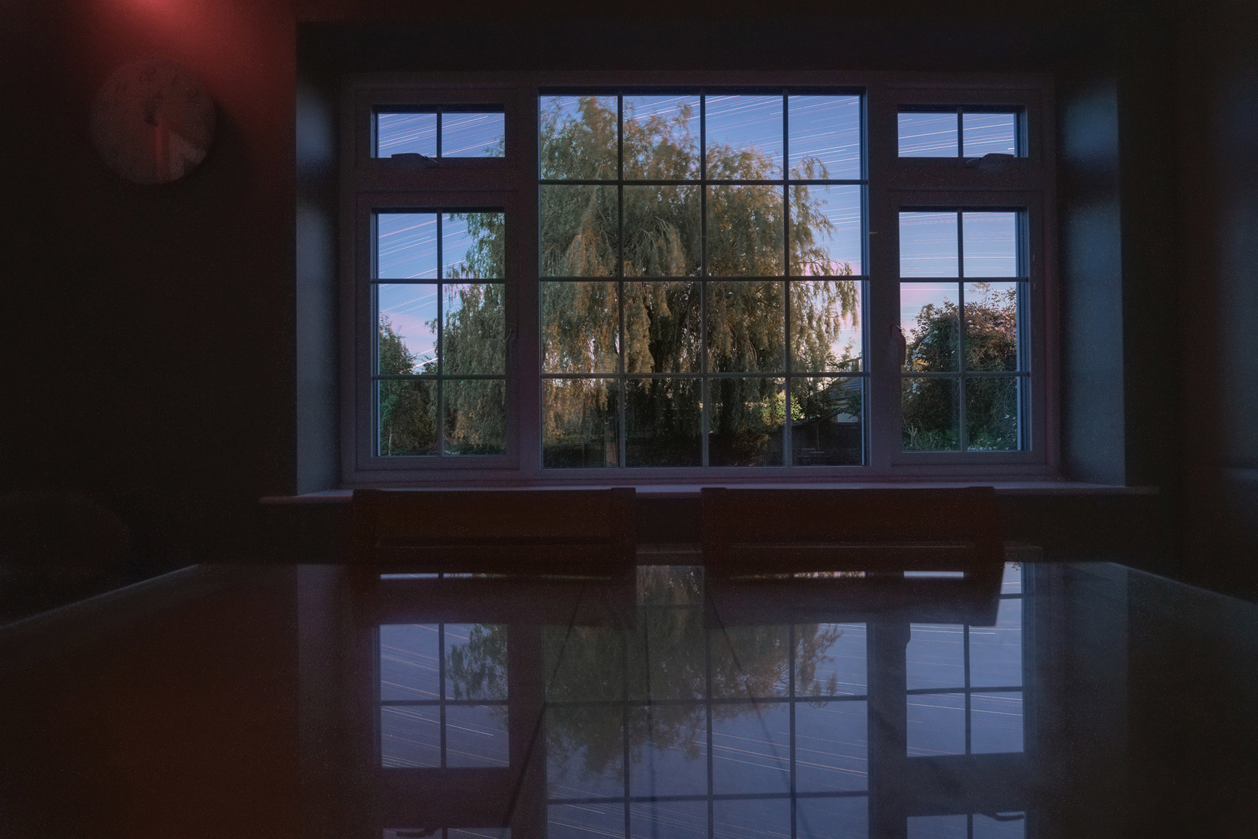 a view of a large window. window indoor building tree door reflection water glass house